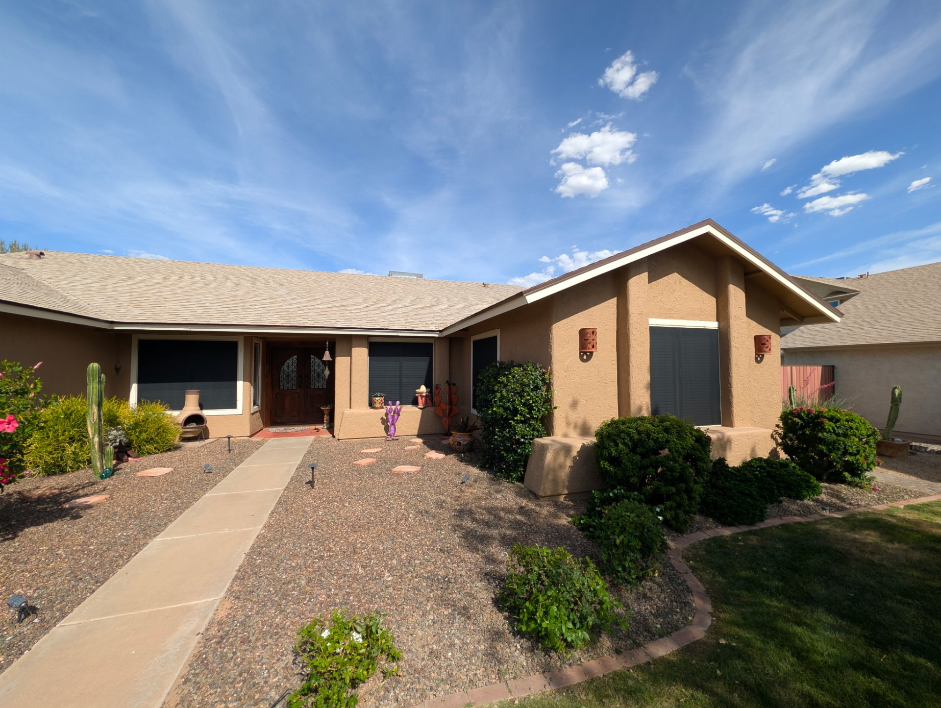 Front of home with premium sun screens